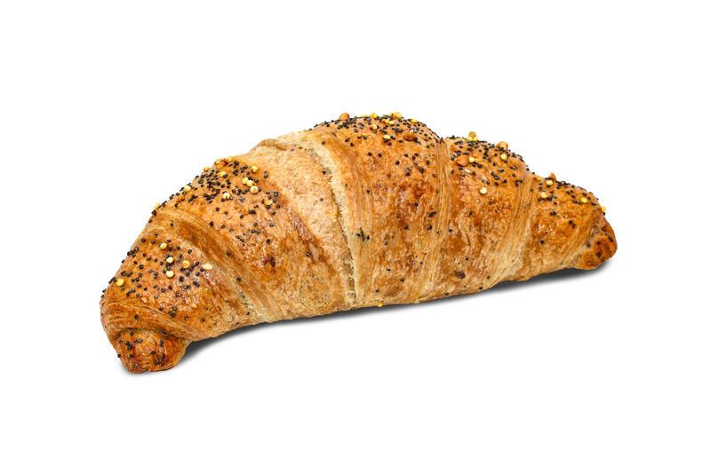Croissant with seeds red fruits and elder flower