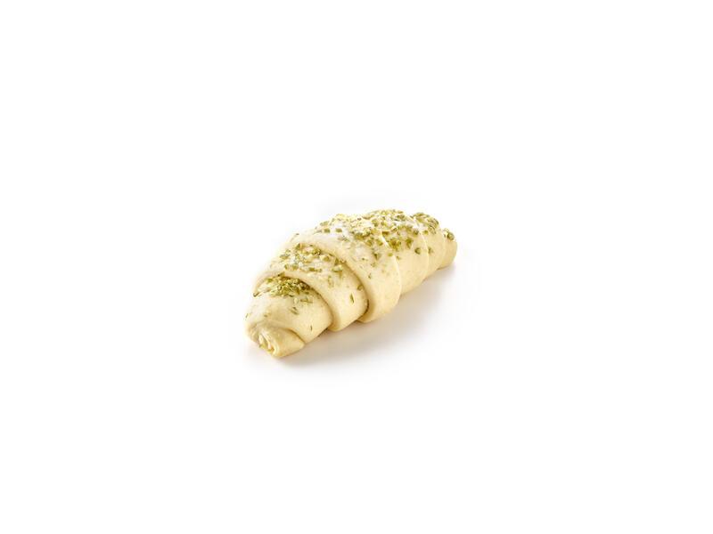 Pistachio filled croissant with pumpkin seed decoration