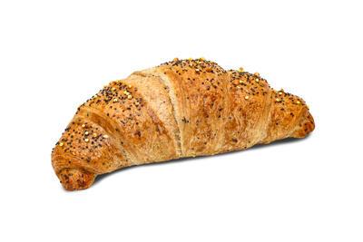 Croissant with seeds red fruits and elder flower